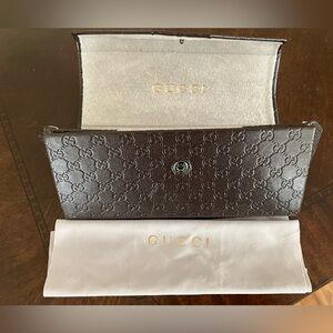Gucci sunglass case with lens cloth $50